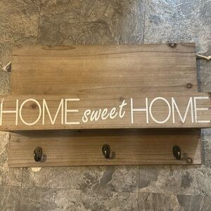 Welcome sign with hooks